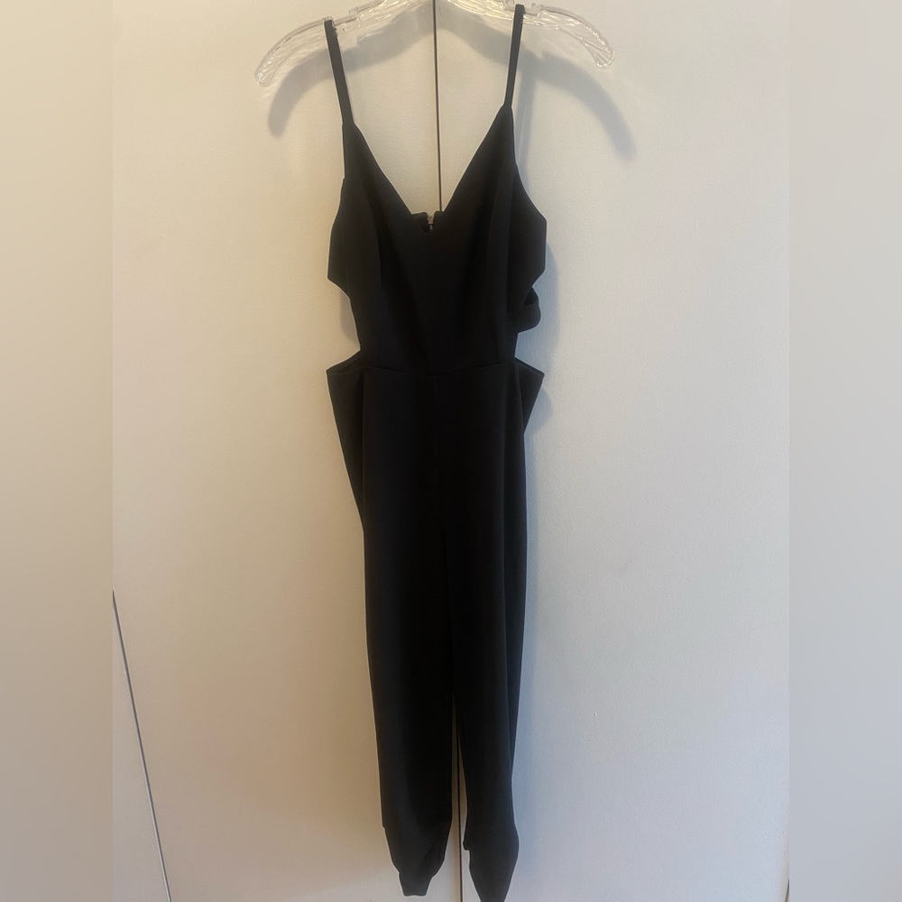 Aqua jumpsuit. Color: black size: Medium
